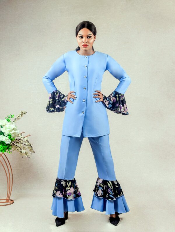 lady wearing the prisci double layered bell bottoms suit by Ria Kosher