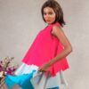 model posing tri-coloured buttoned chiffon ruffle dress designed by Ria Kosher - back view