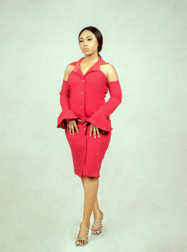 lady wearing a red bell sleeves hourglass suit dress by Ria Kosher