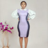 a model standing at akimbo in lilac collared illusion sheath dress by Ria Kosher