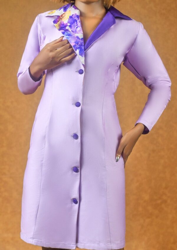 lady wearing a lavender hourglass blazer dress designed by Ria Kosher - close up