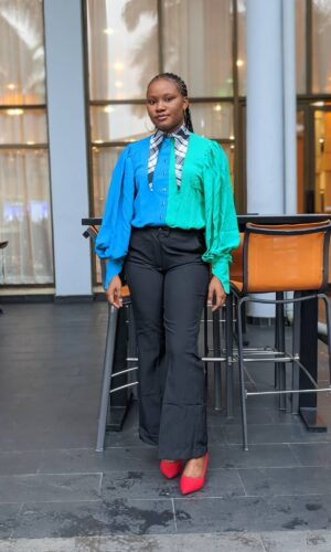 Victoria wearing Victorian Multicoloured Shirt and Pants by Ria Kosher